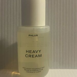 Phlur hair and body fragrance mist in the scent HEAVY CREAM